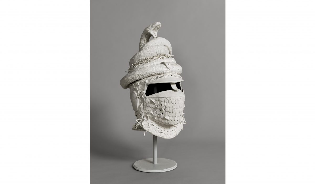 Susan Hamburger, Helmet (Snake), 2023. Paper mache, celluclay, paperclay, wire, and wood stand; 15 x 9 x 8 in. © Susan Hamburger. Courtesy of the artist and Asya Geisberg Gallery. Photo by Etienne Frossard
